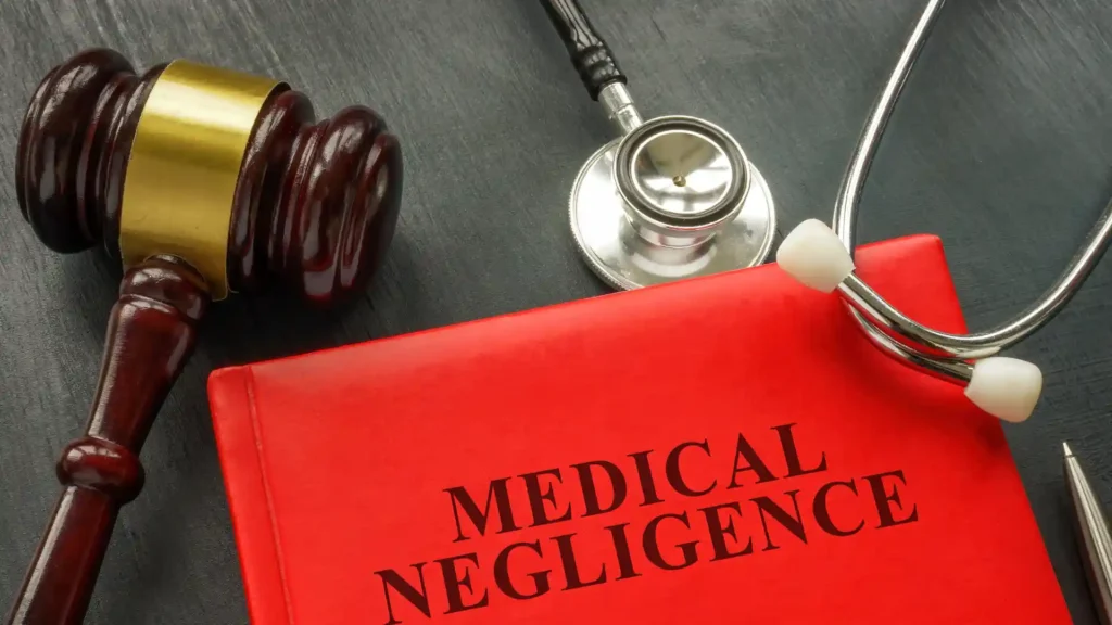 Cosmetic surgery negligence evidence types — medical records, photos and correspondence laid out for solicitor review