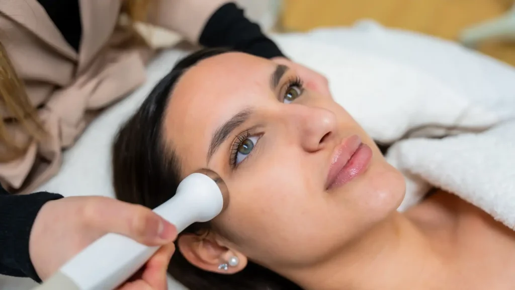 Woman with radiant, youthful skin showing results of anti-ageing treatments — how to take 20 years off your face