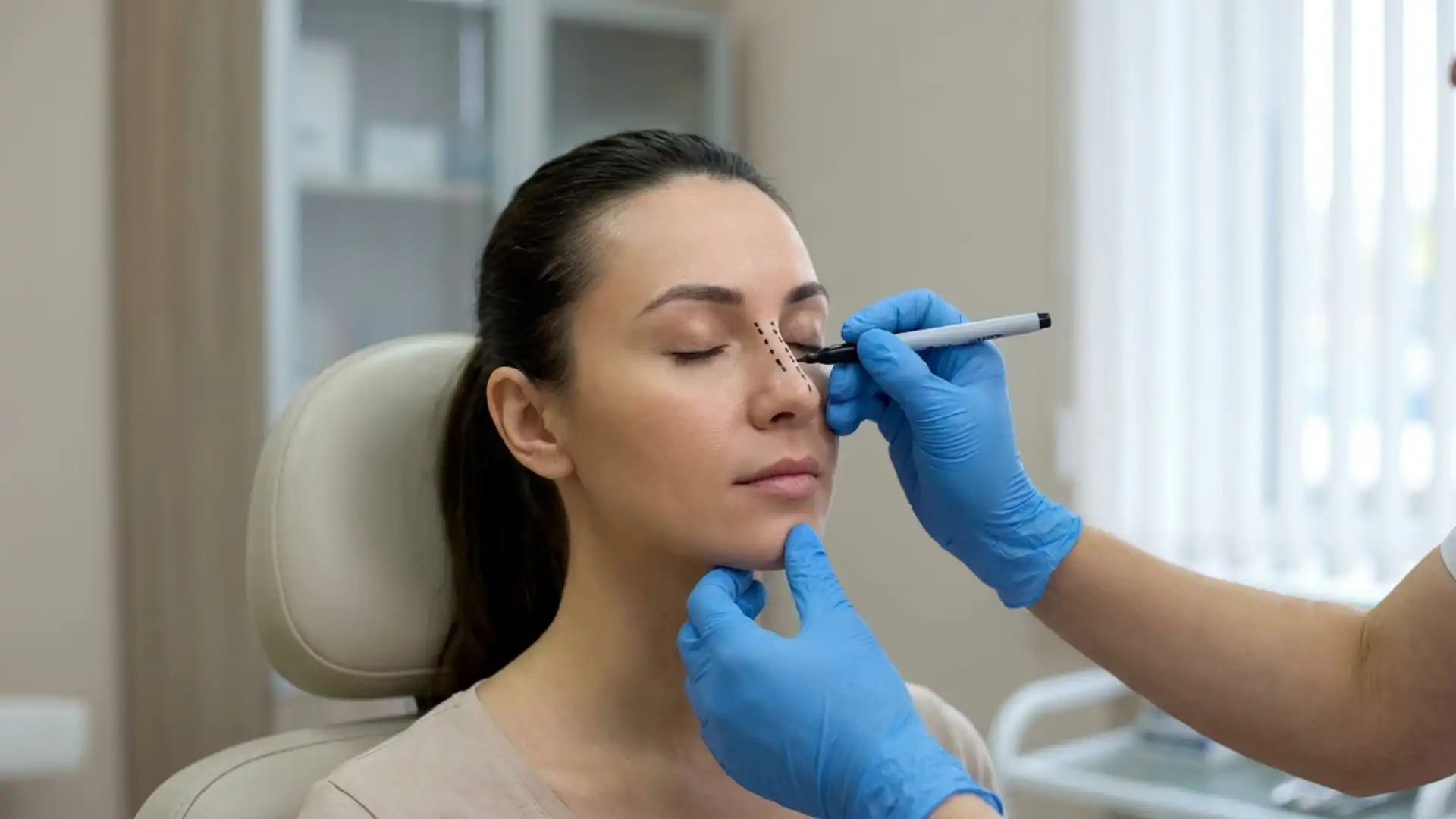 Rhinoplasty gone wrong — patient reviewing medical records to support a rhinoplasty negligence claim