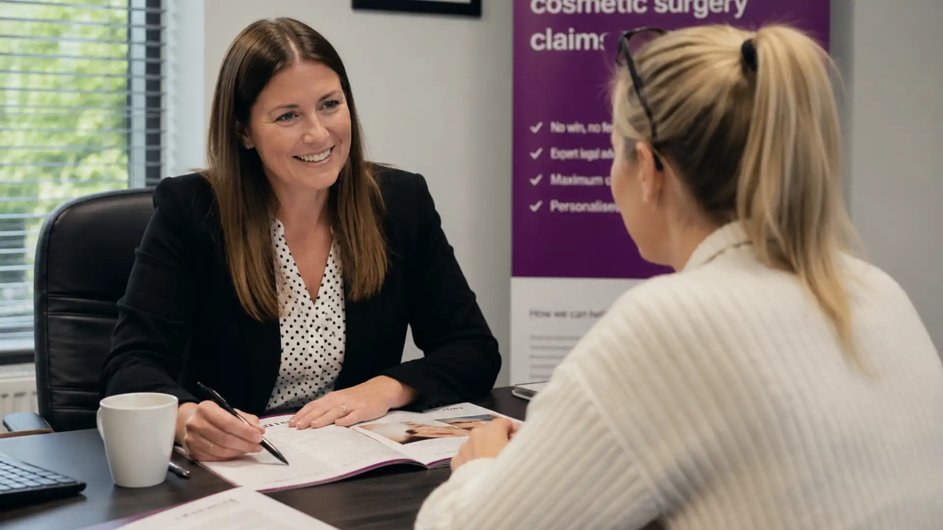 No win no fee cosmetic surgery claim — client speaking with specialist claims adviser